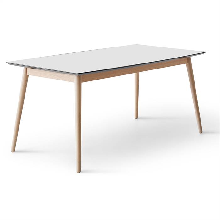 Se Meza by Hammel spisebord - Rounded - 165 x 90 cm. - Hvid laminat - Ben i hvidpigm. eg hos Erling Christensen Møbler
